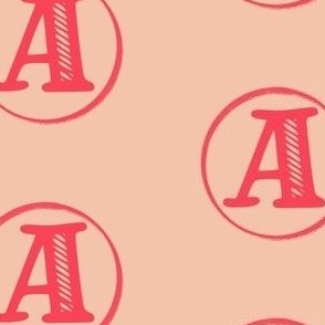 pink monogram letter in pink circle