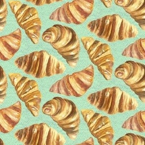 Small French Croissants on Mint Green Linen
