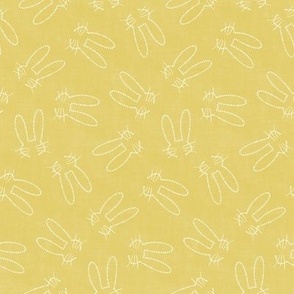 Minimalist dotted bunny rabbit outline on mustard yellow linen Medium