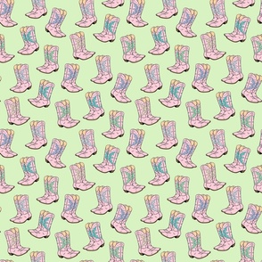 Cowboy boots in pink on a green background (small)