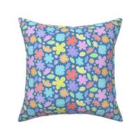 Mock Patchwork  Felt Florals in Pastel Rainbow Colours on a blue background 