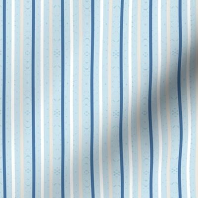 thin vertical blue and yellow stripes on textured light blue | medium