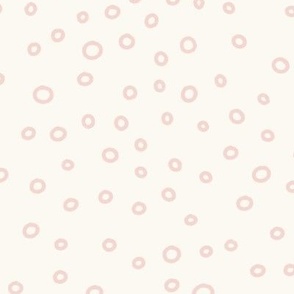 Ocean Life: Hand-Drawn Salmon Pink Water Bubbles on a Cream Background