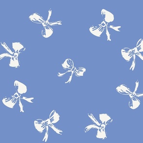 large scale tossed preppy bows in cream on bluebell blue background