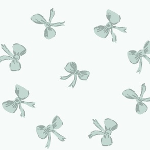 large scale tossed preppy bows in mint green