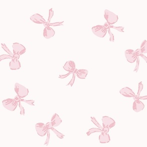 large scale tossed preppy bows in ballerina pink