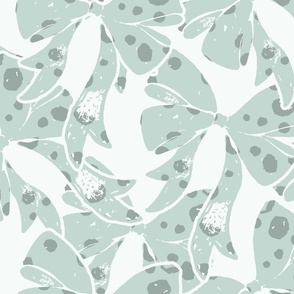 large scale big dotty bows in tonal mint green