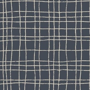 Wavy grid of tan stripes on charcoal gray background.