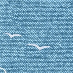 Chambray Cotton Clouds with Seagulls in Bahama Blue (xxl scale) | Summer sky, hand drawn clouds and birds on natural cotton, chambray pattern, warp and weft weave pattern, tropical sky in Caribbean blue, ocean decor.