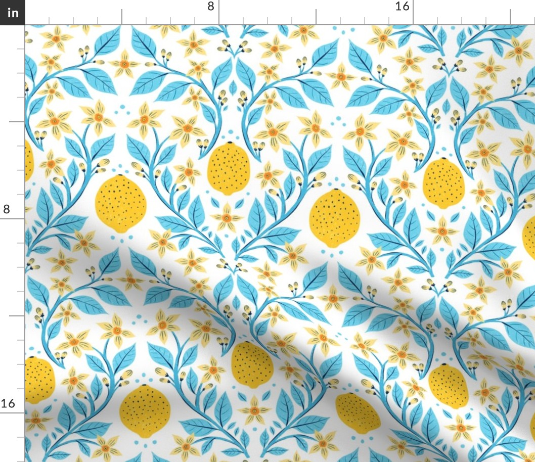 Fresh yellow lemons with blue on white background