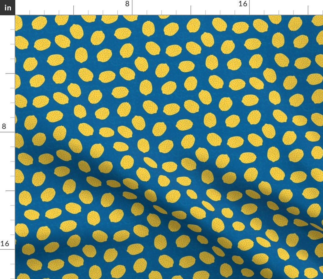 Ditsy yellow lemons on blue background