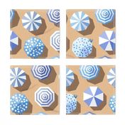 beach umbrellas fun joyful summer vacation blue white sand - medium