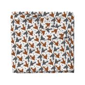Trotting Springer Spaniels and paws - white