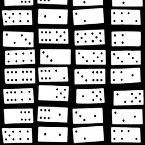 dominoes on black