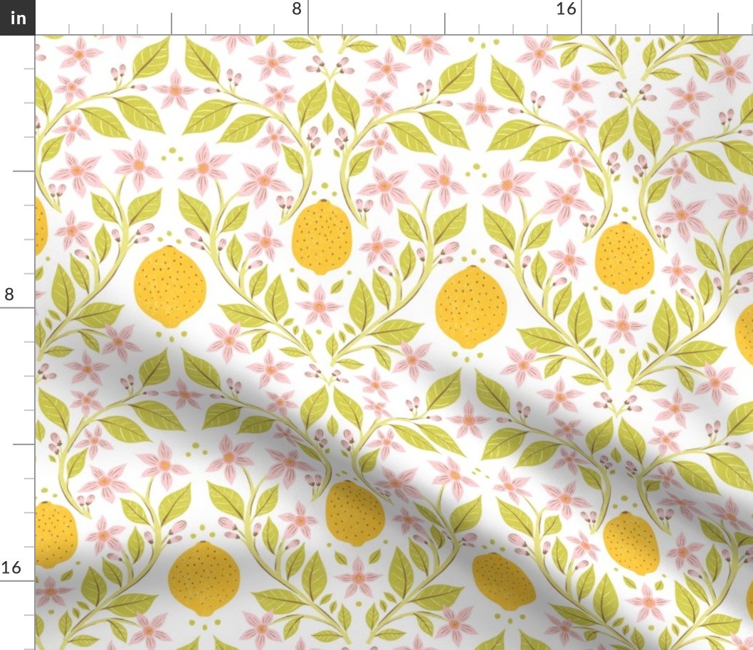 Fresh Yellow Lemons and Pink Flowers with Green Leaves on White Background