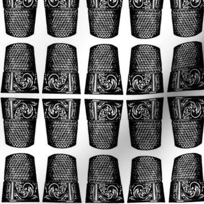 thimble with scrolls 