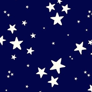 Scattered stars on bright midnight blue