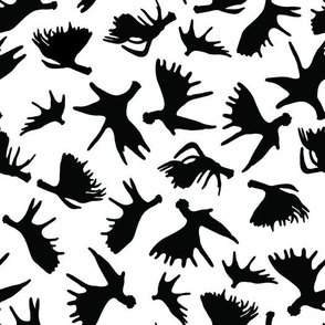 Black Moose Antler Silhouettes on a White Background Creating a Surface Pattern Design