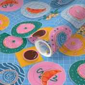 Happy Breakfast Sweet Treats - pastries on bright patterned plates