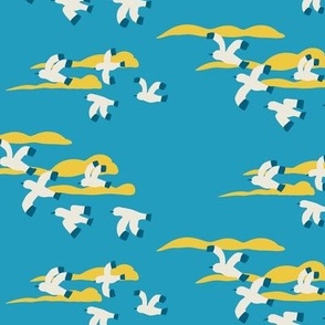 (S) Brighton Beach Seagulls - flying sea birds against yellow clouds on a blue sky