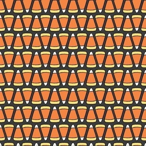 Small Geometric Cartoon Candy Corn in Dark Gray, Orange, and Yellow for Halloween