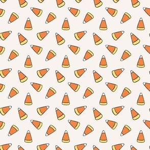 Small Tossed Cartoon Candy Corn in Cream White, Orange, and Yellow for Halloween
