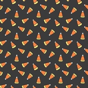 Small Tossed Cartoon Candy Corn in Dark Gray, Orange, and Yellow for Halloween