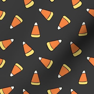 Medium Tossed Cartoon Candy Corn in Dark Gray, Orange, and Yellow for Halloween