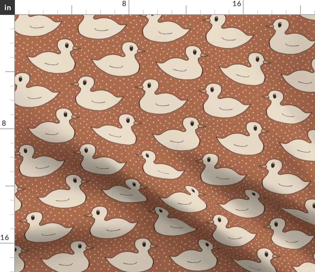 Sand toy duckling in moody earthy rust brown - cute minimal pattern with dots for kids