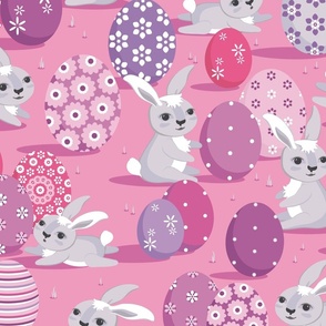 Easter bunnies on pink background