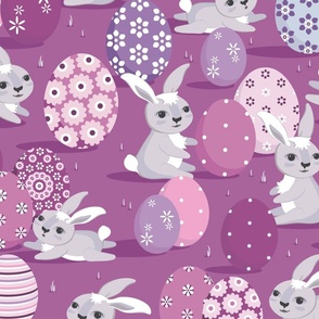 Easter bunnies on a dark lilac background