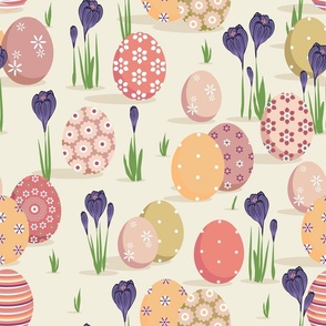 Painted eggs and crocuses on a beige background