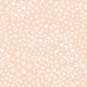 Ditsy simple white florals on light orange peach