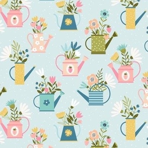 Watering Cans and Spring Flowers in green, yellow and pink on light blue | Medium 