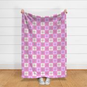 Colorful crosses on pink and white gingham - approximately 4 1/4 inch squares on the fabric. 