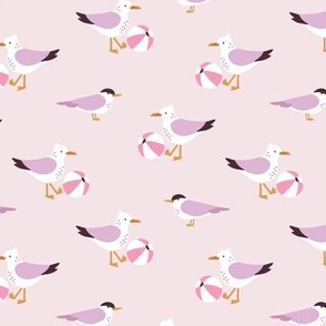Seagulls and terns playing with beach balls - beige, purple and pink - small scale