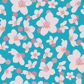 white and pink cherry blossoms on bright blue background with pink polka dots