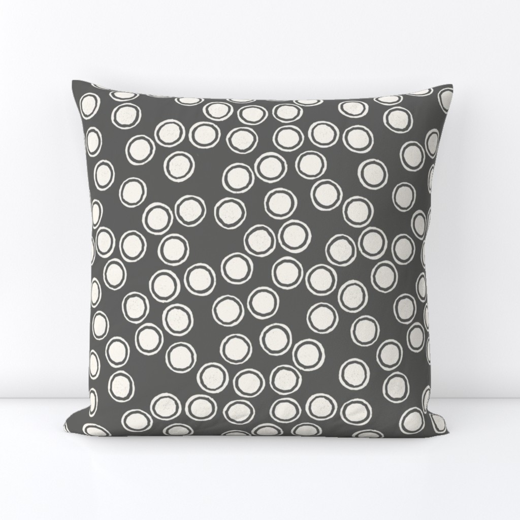 Small Block Printed Field of Polka Dots in ecru off white on dark cool grey