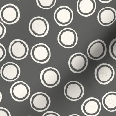 Small Block Printed Field of Polka Dots in ecru off white on dark cool grey