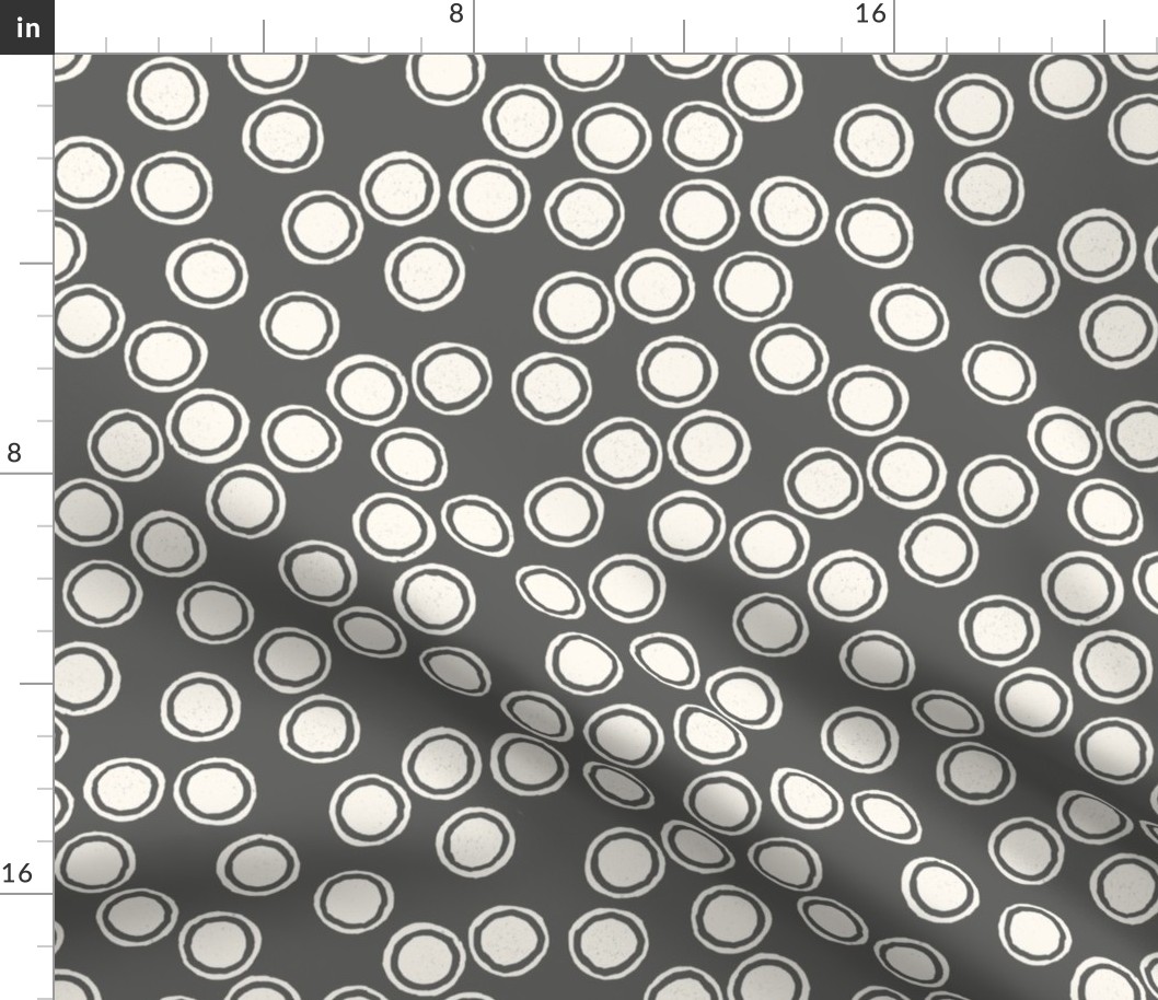 Small Block Printed Field of Polka Dots in ecru off white on dark cool grey