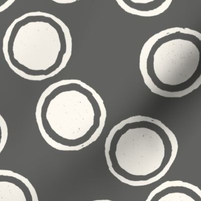 Large Block Printed Field of Polka Dots in ecru off white on dark cool grey