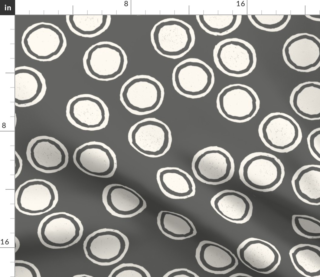 Large Block Printed Field of Polka Dots in ecru off white on dark cool grey