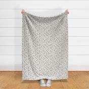Small Block Printed Field of Polka Dots in ecru off white on light warm grey