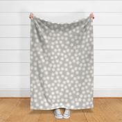 Large Block Printed Field of Polka Dots in ecru off white on light warm grey