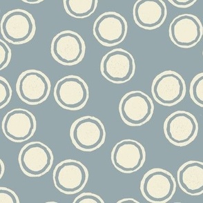Small Block Printed Field of Polka Dots in deep cream on ocean blue