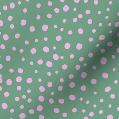 L|Geometric irregular pink speckled polka dots on lehigh green