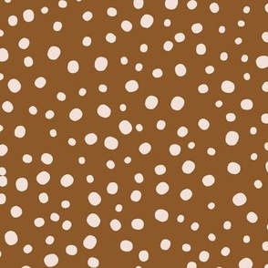 L|Geometric irregular white speckled polka dots on ochre