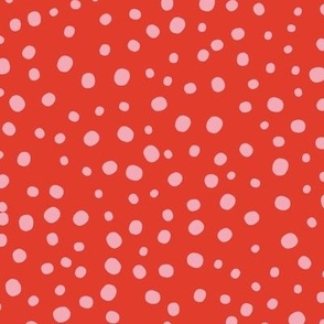 L|Geometric irregular light rose speckled polka dots on coral red