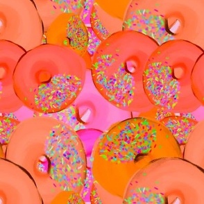Brightly colored Orange and Pink donuts / Glazed Donuts / Iced Donuts 