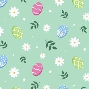 Easter eggs on a green background - small scale